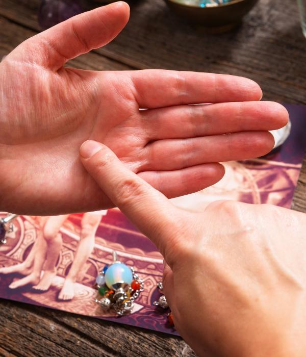 A palm being pointed at and read