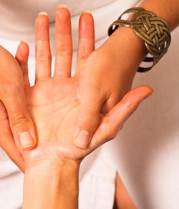 Hands of an Acupressure Practitioner